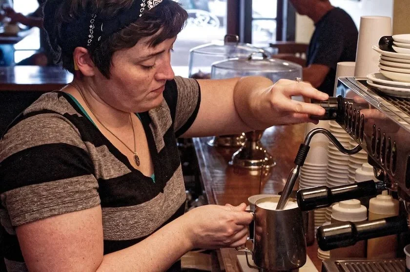Woman making coffee. photo by 27707 on Pixabay
