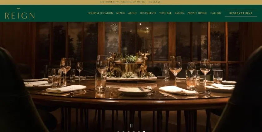 Reign restaurant's homepage featuring a picture of a dining table.