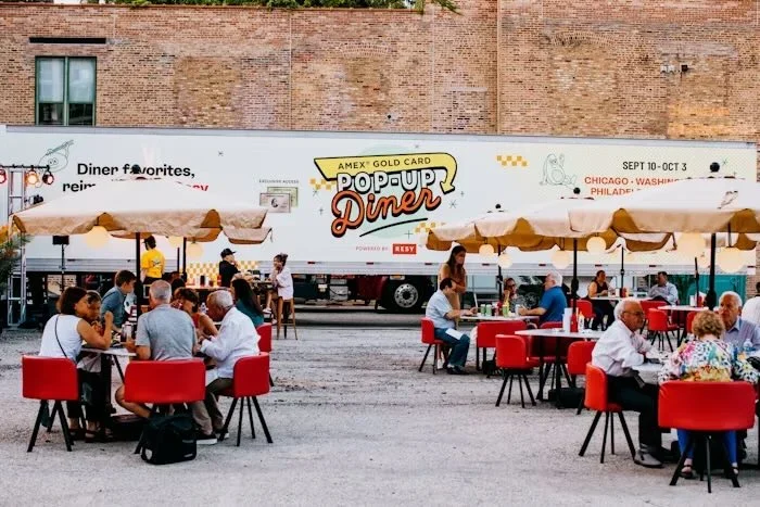 A pop up diner with outdoor seating.