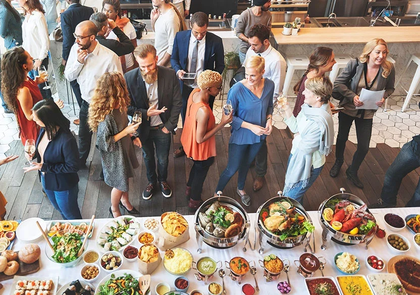 People gathering around a buffet